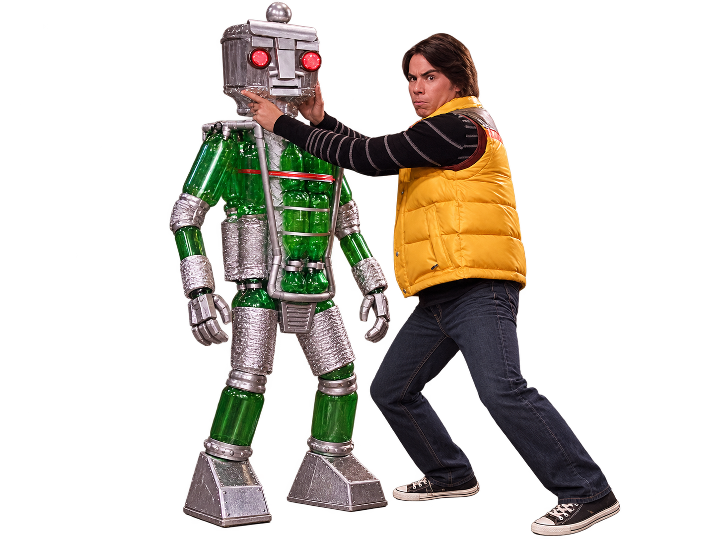 Spencer Shay with one of his handmade robots